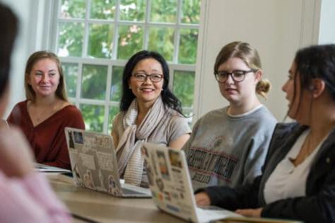 Associate Professor of the English Tara Robbins Fee, Ph.D., works with students.